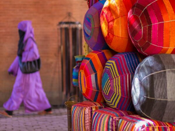 A vibrant view of Marrakech medina showcasing its bustling markets and historic charm, epitomizing the exclusive experiences of Luxury Morocco Tours.