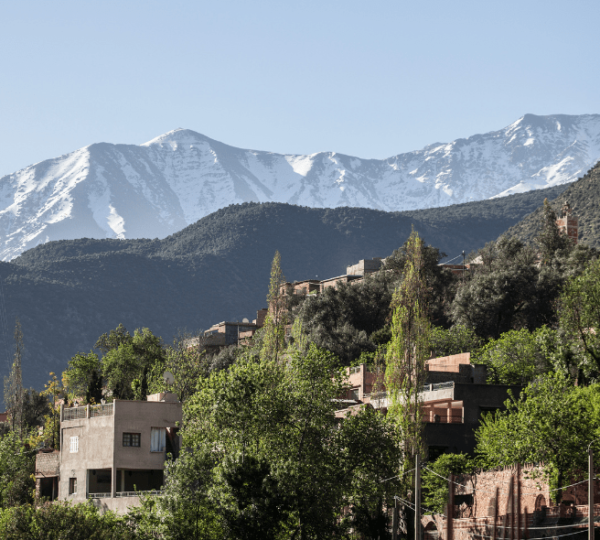 A breathtaking view of the Atlas Mountains featured in our Morocco Travel Guide, showcasing the natural beauty of Morocco.